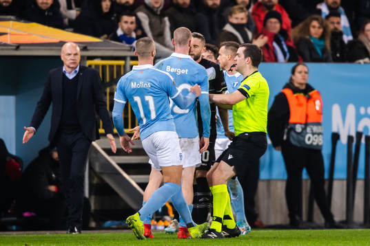 Jo Inge Berget of Malmö FF in a dispute with Fabio Daprela
