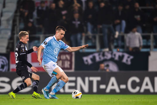Jonas Knudsen of Malmö FF and Mattia Bottani of Lugano