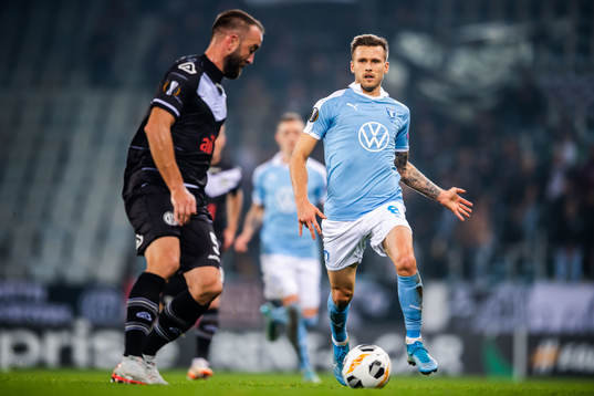 Mijat Maric of Lugano and Arnor Traustason of Malmö FF