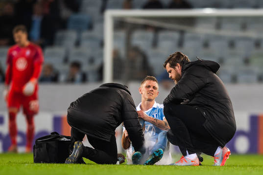 Sören Rieks of Malmö FF receives medical treatment