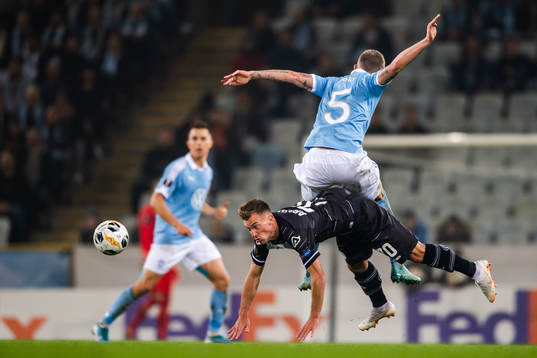 Marco Aratore of Lugano and Sören Rieks of Malmö FF
