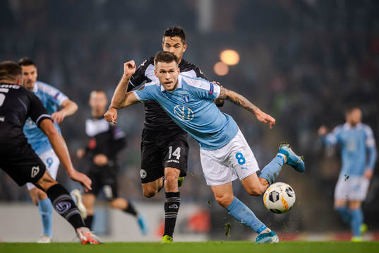 Jonathan Sabbatini of Lugano and Arnor Traustason of Malmö