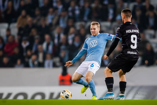 Oscar Lewicki of Malmö FF and Filip Holender of Lugano