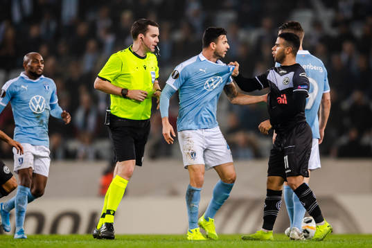 Behrang Safari of Malmö FF in a dispute with Carlinhos