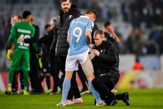 Markus Rosenberg of Malmö FF receives medical attention