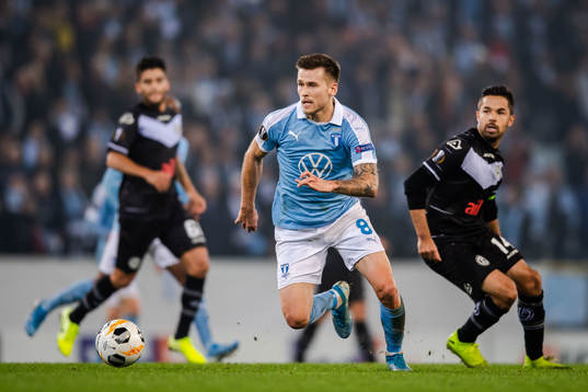 Arnor Traustason of Malmö FF and Jonathan Sabbatini of