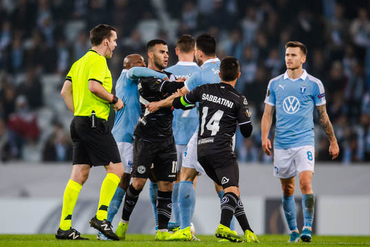 Behrang Safari of Malmö FF in a dispute with Carlinhos