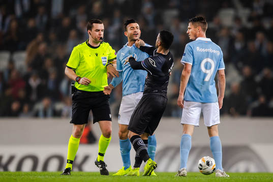 Behrang Safari of Malmö FF in a dispute with Carlinhos