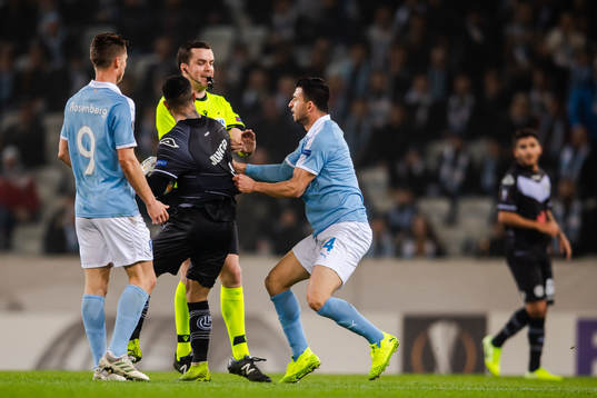 Behrang Safari of Malmö FF in a dispute with Carlinhos