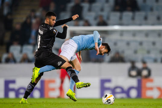 Behrang Safari of Malmö FF and Carlinhos Junior of Lugano