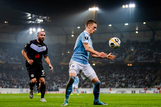 Mijat Maric of Lugano and Sören Rieks of Malmö FF
