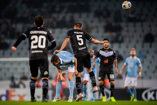 Markus Rosenberg of Malmö FF and Mijat Maric of Lugano