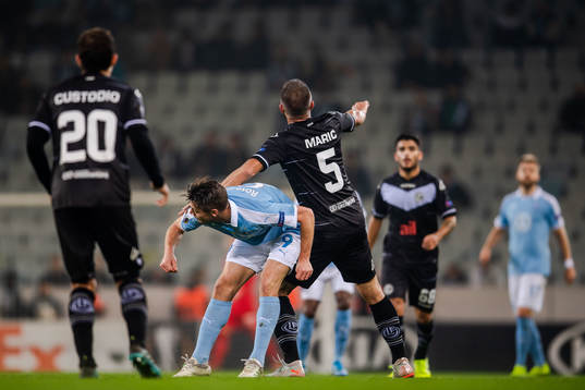 Markus Rosenberg of Malmö FF and Mijat Maric of Lugano