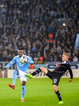 Bonke Innocent of Malmö FF and Mattia Bottani of Lugano