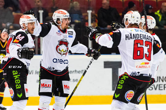 Malmö Redhawks Marcus Björk jublar med lagkamrater