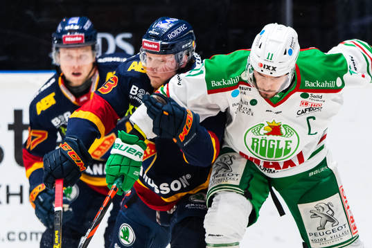 Djurgårdens Kalle Östman och Rögles Mattias Sjögren i