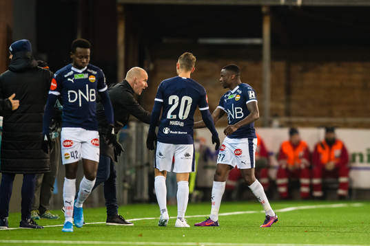 Muhamed Maudo Keita of Strømsgodset celebrates with Henrik