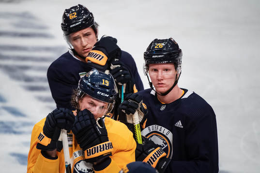 Brandon Montour, Jake McCabe and Rasmus Dahlin of Buffalo