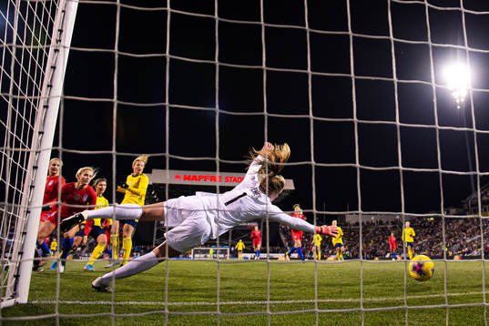 Anna Anvegård of Sweden scores 3-1 behind goalkeeper