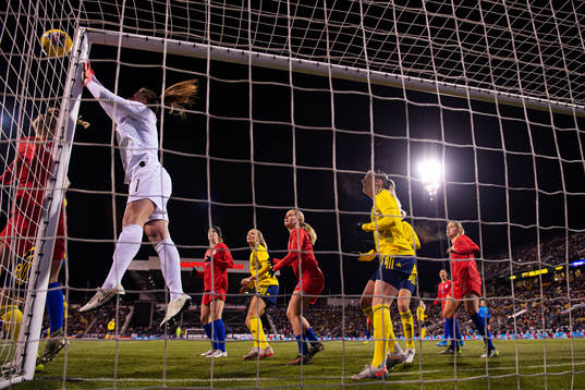 Goalkeeper Alyssa Naeher of USA saves the ball in front of
