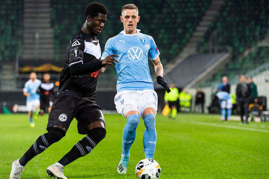 Guy Eloge Koffi Yao of Lugano and Sören Rieks of Malmö FF