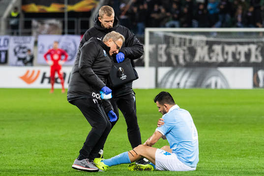 Doctor Pär Herbertsson and physio Alexander Nilsson attend