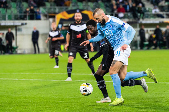 Guy Eloge Koffi Yao of Lugano and Guillermo Molins of