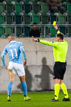 Guillermo Molins of Malmö FF receives a yellow card from