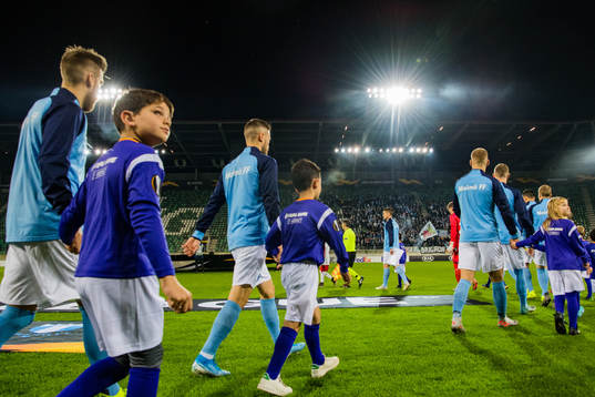 Players of Malmö FF enter the pitch ahead the Europa