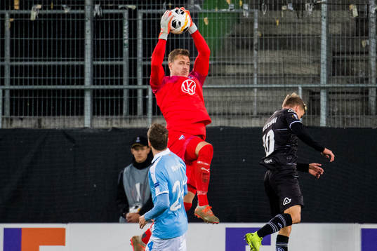 Goalkeeper Johan Dahlin of Malmö FF makes a save