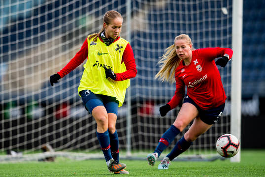 Guro Reiten and Therese Sessy Åsland of Norway