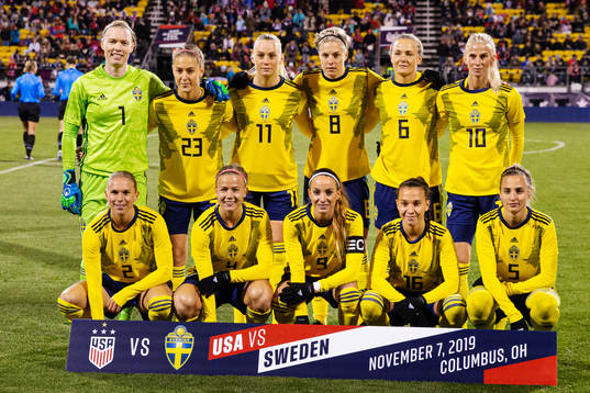 Players of Sweden are lined up for a team photo