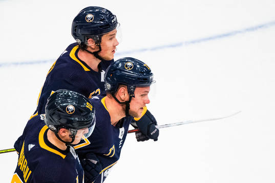 Vladimír Sobotka off Buffalo Sabres is helped of the ice