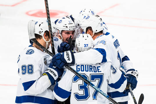Yanni Gourde of Tampa Bay Lightning celebrates with team