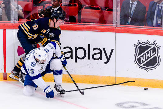 Victor Olofsson of Buffalo Sabres and Cédric Paquette of