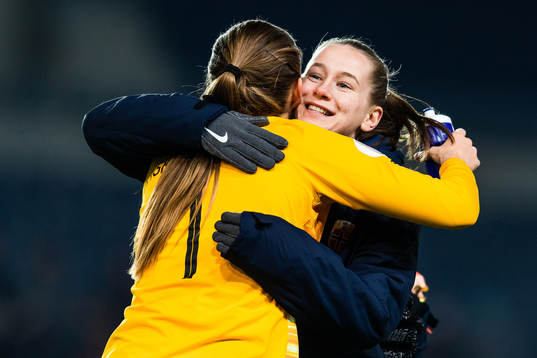 Goalkeeper Cecilie Fiskerstrand hugs Elisabeth Terland of