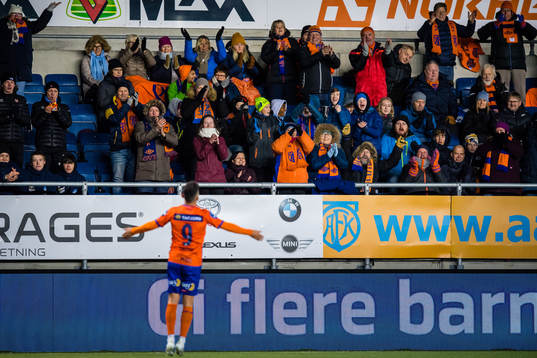 Spectators in the stands celebrates