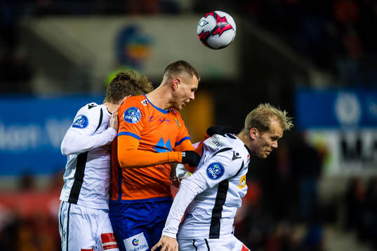 Holmbert Aron Briem Fridjonsson of Aalesund and Lars Grorud