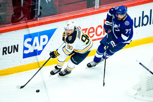 Marcus Johansson of Buffalo Sabres and Victor Hedman of