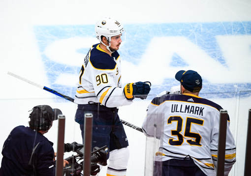 Marcus Johansson and goalkeeper Linus Ullmark of Buffalo