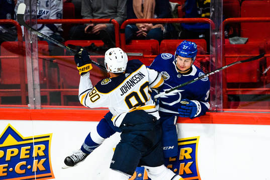Marcus Johansson of Buffalo Sabres and Yanni Gourde of