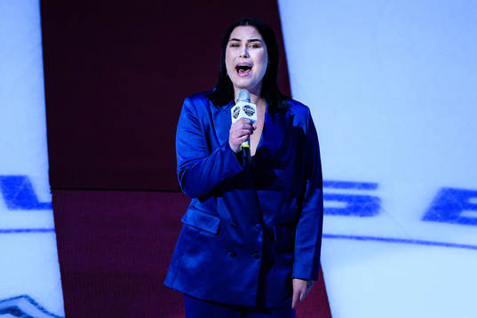 Molly Hammar singing the national anthems prior to the NHL