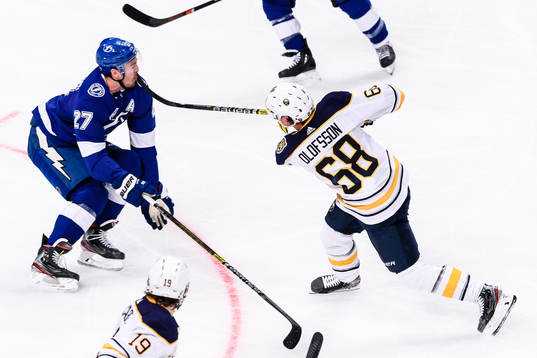 Victor Olofsson of Buffalo Sabres stick hits Ryan McDonagh