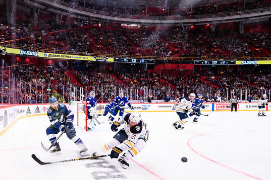 Kevin Shattenkirk of Tampa Bay Lightning and Kyle Okposo of