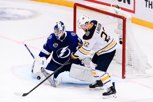 Johan Larsson of Buffalo Sabres in front of goalkeeper