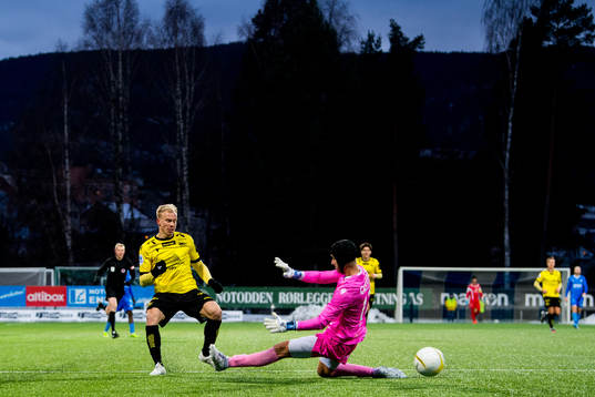 Martin Ramsland of Start scores 0-1 behind goalkeeper Espen