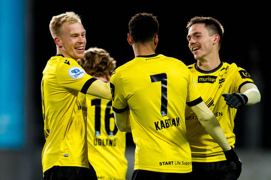 Martin Ramsland of Start celebrates with teammates Kevin