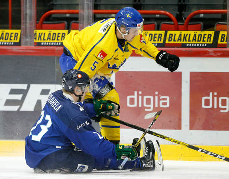 Antti Saarela #23, FIN and Philip Broberg #5, SWE