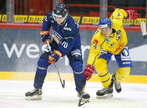 Patrik Puistola #20, FIN and Adam Ginning #4, SWE
