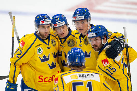 Olle Alsing #38, SWE 2-1 celebrating with team mates Daniel